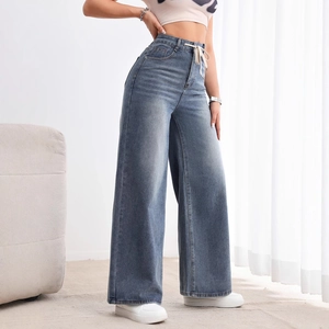 Jean femme taille haute à jambes larges bleu délavé avec cordon de serrage réglable