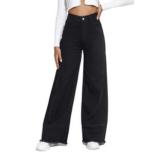 Detail of high-waisted black wide-leg jeans with stylish raw fringe hem and casual fit