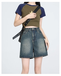 High waist wide leg denim shorts with vintage wash paired with casual crop top
