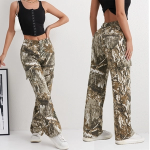 Detail view showing camouflage cargo pants with large side pockets and forest pattern