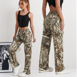 Detail view of women's camouflage cargo pants showing side pockets and straight fit