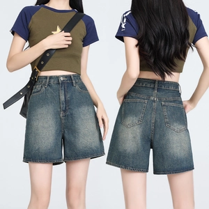 Women's high waist denim shorts with retro wash finish and relaxed wide leg fit
