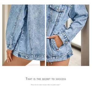 Detailed view of light blue washed denim jacket with metal buttons and flap pockets