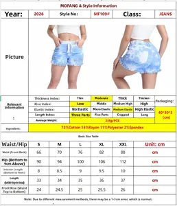 Size chart and fabric details for distressed tie-dye denim shorts for women with raw hem