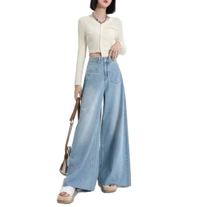 Women high waisted wide leg jeans in light blue wash with raw hem and large pockets