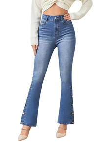 Detail view of flared jeans featuring decorative metal side buttons and retro wash finish