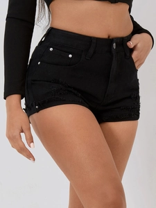 Detailed view of high waist black denim shorts featuring raw hem and distressed textures