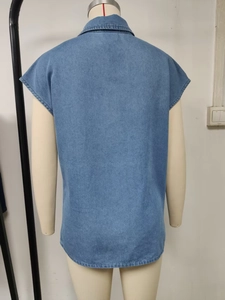 Back view of a blue denim vest with turn-down collar and premium fabric texture
