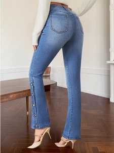Women's vintage slim fit flared jeans with stylish side button slit in light blue
