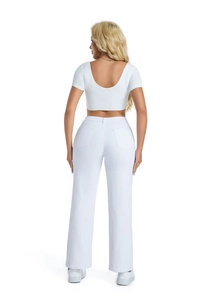 Rear view of woman wearing white high-waist straight jeans and cropped short sleeve top