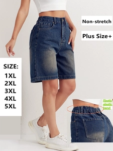 Detail of high-waisted plus size denim shorts showing elastic back waistband and 1XL-5XL sizing