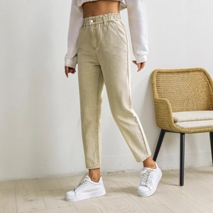 Slim fit light khaki high waist jeans with elastic waist and cropped length for women