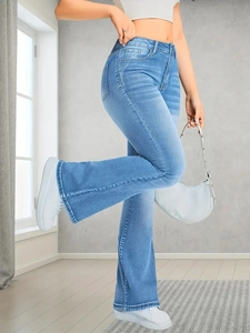 Slim-fit light blue high-waisted flare jeans with washed-out detailing for women