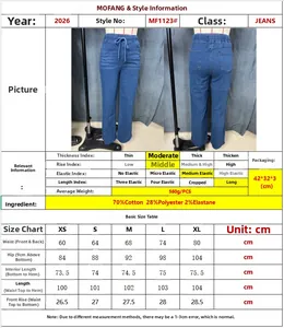 Detailed size guide table for light blue drawstring straight leg denim jeans with measurements