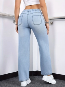 Rear view detail of light blue straight-leg jeans with elastic drawstring waist and back pockets