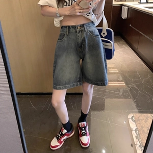 Short en jean taille haute bleu clair avec coupe large décontractée et effet délavé