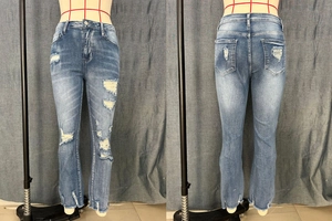 Details von blauen Skinny-Jeans mit Distressed-Löchern und Fransensaum-Design
