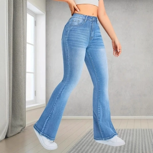 Slim fit high-waisted flared jeans in light blue wash with vintage faded effect