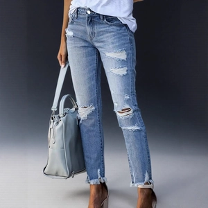 Mittelblaue Ripped Skinny Jeans mit ausgefransten Säumen und hochelastischem Denim-Stoff