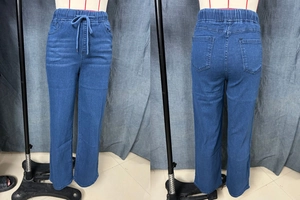 Front and back view of high-waist drawstring denim pants with elastic waist and pockets