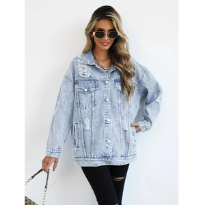 Vintage light blue oversized denim jacket for women with distressed ripped details