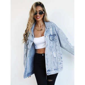 Oversized light blue denim jacket with distressed ripped details and washed denim finish