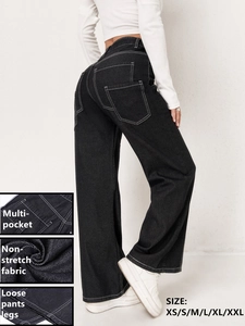 Detail view of high waist black wide leg cargo jeans showing non-stretch fabric and multi-pockets