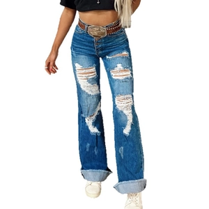 High waist distressed wide leg jeans with ripped details and cuffed hem in vintage blue