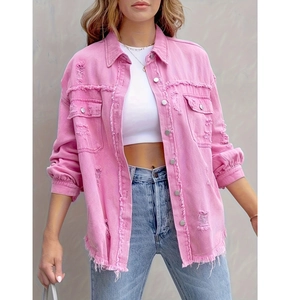 Pink oversized distressed denim shirt jacket with metal buttons and chest pockets