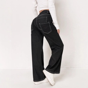 High waist black wide leg jeans with contrast white stitching and large back pockets