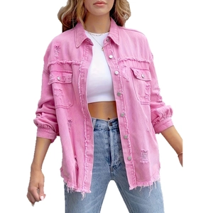 Pink distressed denim jacket with heavy rips, fringe details and metal buttons for women