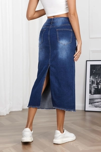 Detail of high waist denim skirt with back slit design and retro washed finish
