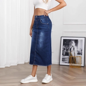 High-waisted dark blue washed denim midi skirt with frayed hem and A-line silhouette