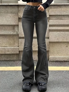 Close-up of dark grey high-waisted flared jeans with vintage washed effect and wide leg fit