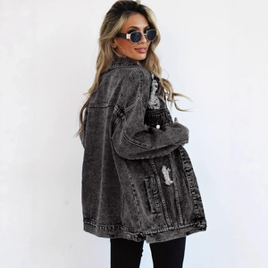 Oversized black acid wash denim jacket with distressed details and drop shoulder
