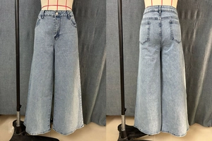 Front and back view of light blue wide-leg jeans with sparkling rhinestone embellishments