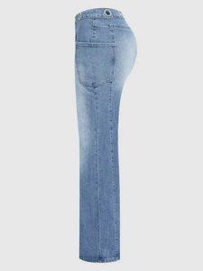 Detail view of high waist jeans featuring metallic ring eyelets and large side patch pockets