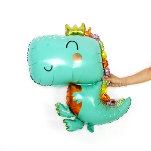 Cute green brachiosaurus foil balloon with gold crown for dinosaur birthday party decor