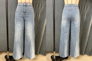 Front and back view of light blue high-waist wide-leg jeans with vintage washed texture