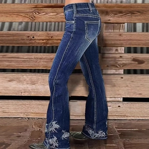 Dark blue low-rise bootcut jeans with white horse embroidery and denim boots