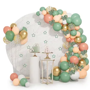 Sage green and gold latex balloon arch kit with eucalyptus leaves for party decor