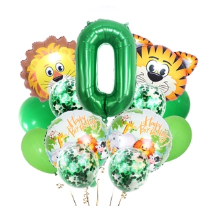 Détail du kit de ballons jungle avec têtes d'animaux et ballon chiffre 0 vert
