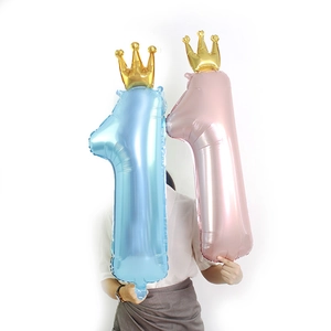 Pearly pink and blue 36-inch number 1 foil balloons with gold crowns for first birthdays