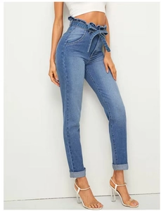 Detailed view of high waist denim pants with ruffled waistband and sky blue drawstring