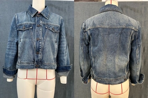 Front and back detail of washed blue cropped denim jacket with classic metal buttons