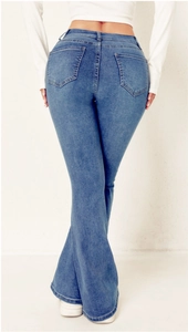 Rear view of high-waisted mid-blue flared jeans with back pockets and slim fit