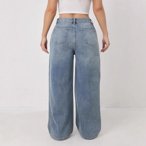 Women's light blue high-waisted wide-leg jeans shown from the back in a loose fit style