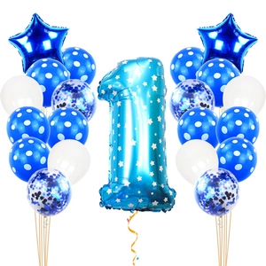 Close-up of blue number 1 balloon set with stars, confetti and star-shaped balloons