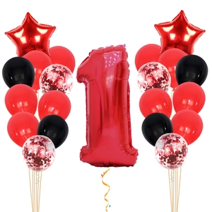 Detail of red number 1 balloon set with star foil and latex confetti balloons for birthday