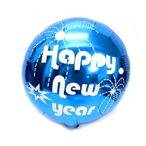 Close-up of a blue round New Year balloon with Happy New Year text and fireworks